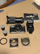 Canon AT-1 35mm Film SLR Camera with FD 50mm f1.8 Lens Silver Black Vintage