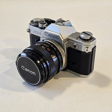 Vintage Canon AT-1 35mm SLR Film Camera w/ Canon FD 50mm f/1.4. Lens