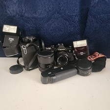 Canon AE-1 Program 35 mm film camera W 52, 55, and 58-200mm Zoom Lense Bundle