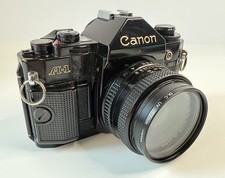 Canon A-1 35mm SLR Film Camera FD 50mm f/1.8 + 80-200mm Lens Tested Working