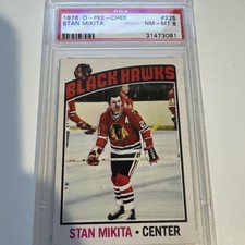 31473081 1976-77 O-PEE-CHEE #255 Stan Mikita Chicago Blackhawks PSA 8 NM-MT