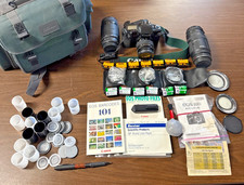Canon EOS Elan 35mm SLR Film Camera COMES 2 LENSES AND 13 CANS OF FILM
