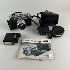Vintage Yashica TL-Electro 35MM Film Camera and Manual with Extra Lenses